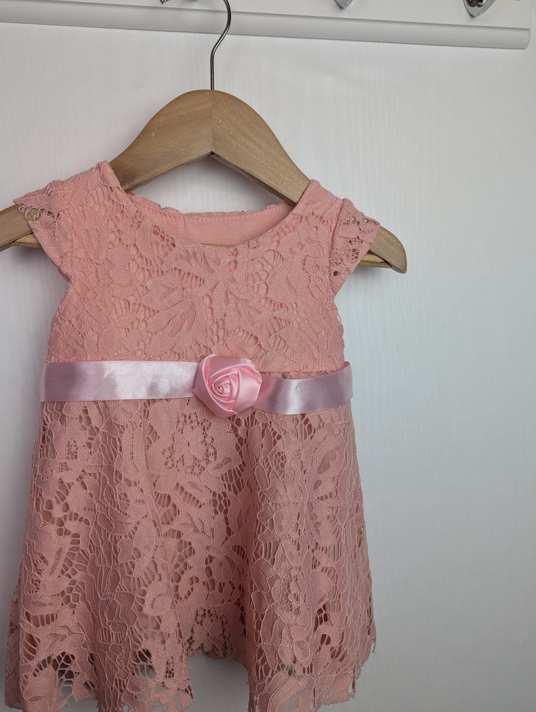 Unbranded Pink Floral Dress - Girls 9 Months Little Ones Preloved Used, Preloved, Preworn Baby, Girls & Boys Clothes. Kids & Children's second hand Clothing UK Online. Cheap affordable. Brands including Next, Joules, Nutmeg Morrisons, TU, F&F, H&M.