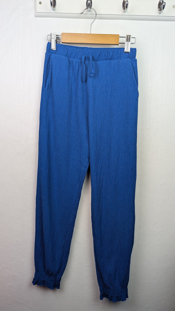 Zara Blue Cuffed Trousers - Girls 11-12 Years Little Ones Preloved Used, Preloved, Preworn Baby, Girls & Boys Clothes. Kids & Children's second hand Clothing UK Online. Cheap affordable. Brands including Next, Joules, Nutmeg Morrisons, TU, F&F, H&M.