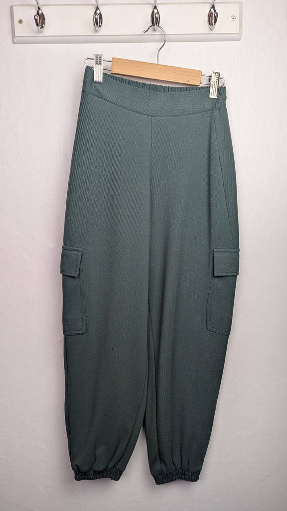 Zara Green Cuffed Trousers - Girls 13-14 Years Little Ones Preloved Used, Preloved, Preworn Baby, Girls & Boys Clothes. Kids & Children's second hand Clothing UK Online. Cheap affordable. Brands including Next, Joules, Nutmeg Morrisons, TU, F&F, H&M.